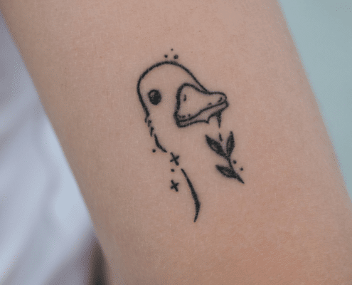 Fine-line tattoos are soft and delicate and cute like this duck.