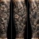 A close-up of a beautiful shin tattoo showcasing intricate designs and expert craftsmanship