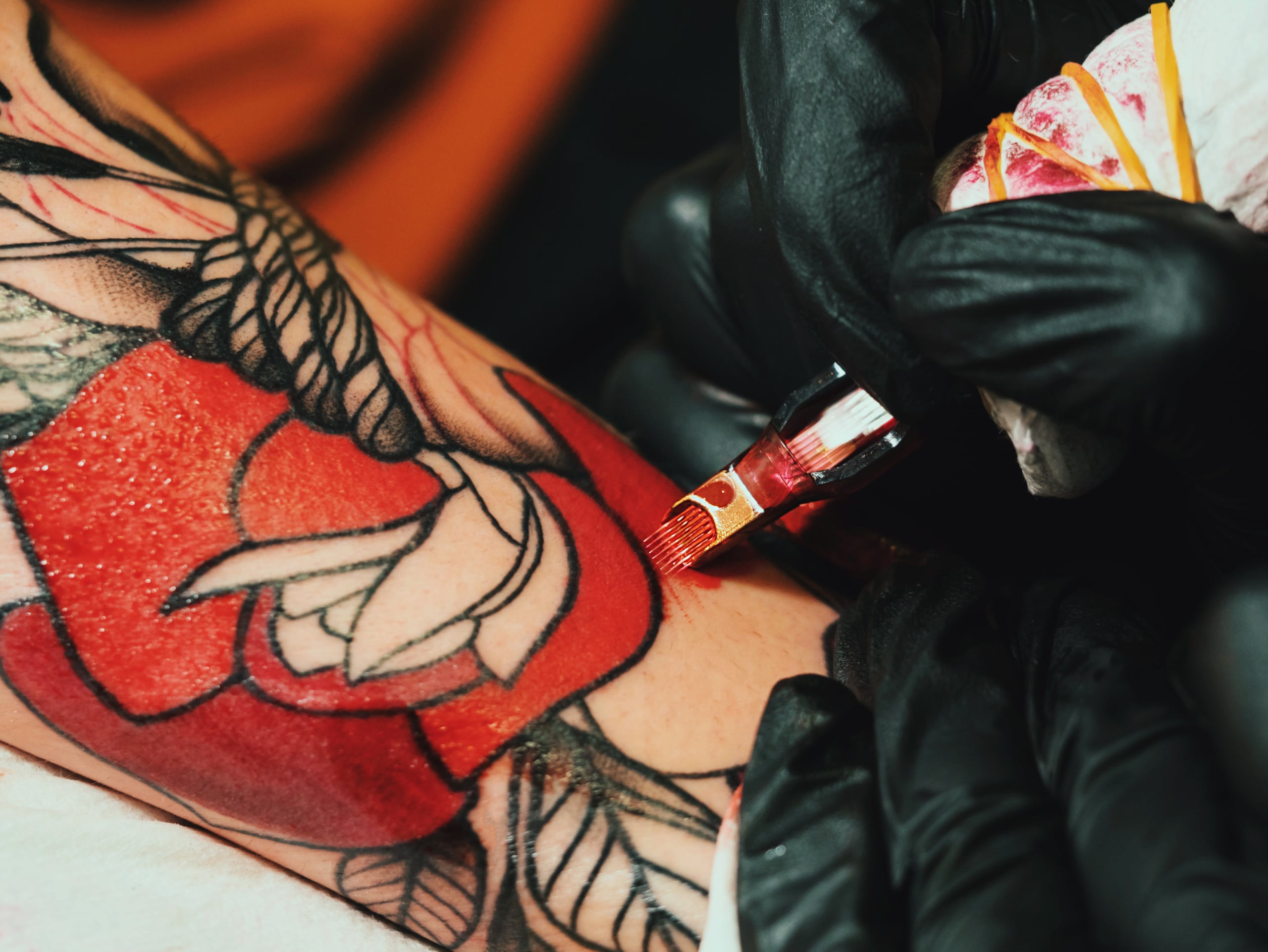 Color tattoo with vivid hues and intricate shading, creating a bold and artistic design on the skin